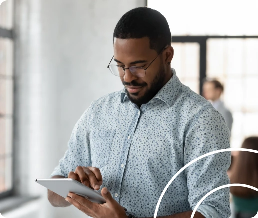 Business professional reviewing employee leave applications and historical records on laptop